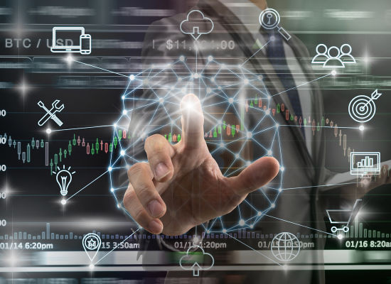 Man's hand interacting with a futuristic hologram display of icons