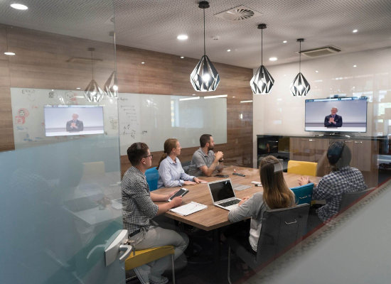Businesspeople having a online meeting in a conference room
